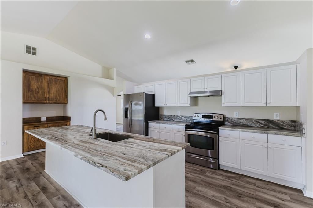 Image 12 of property listing at 408 NE 25th ST, Cape Coral, FL 33909