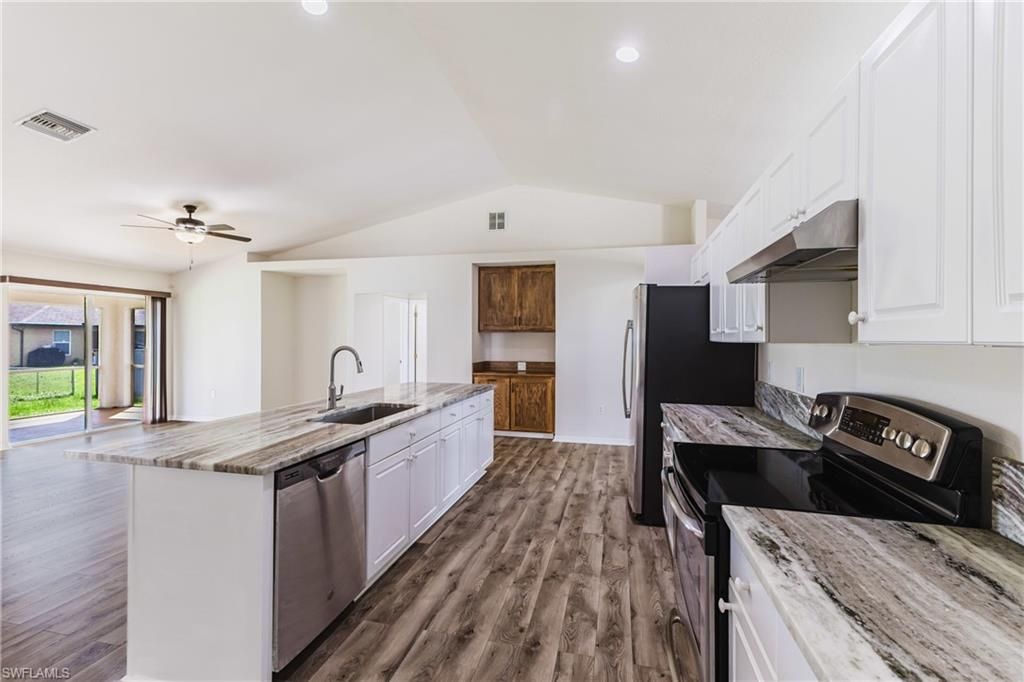 Image 14 of property listing at 408 NE 25th ST, Cape Coral, FL 33909