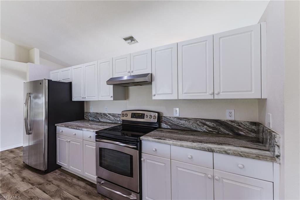 Image 15 of property listing at 408 NE 25th ST, Cape Coral, FL 33909