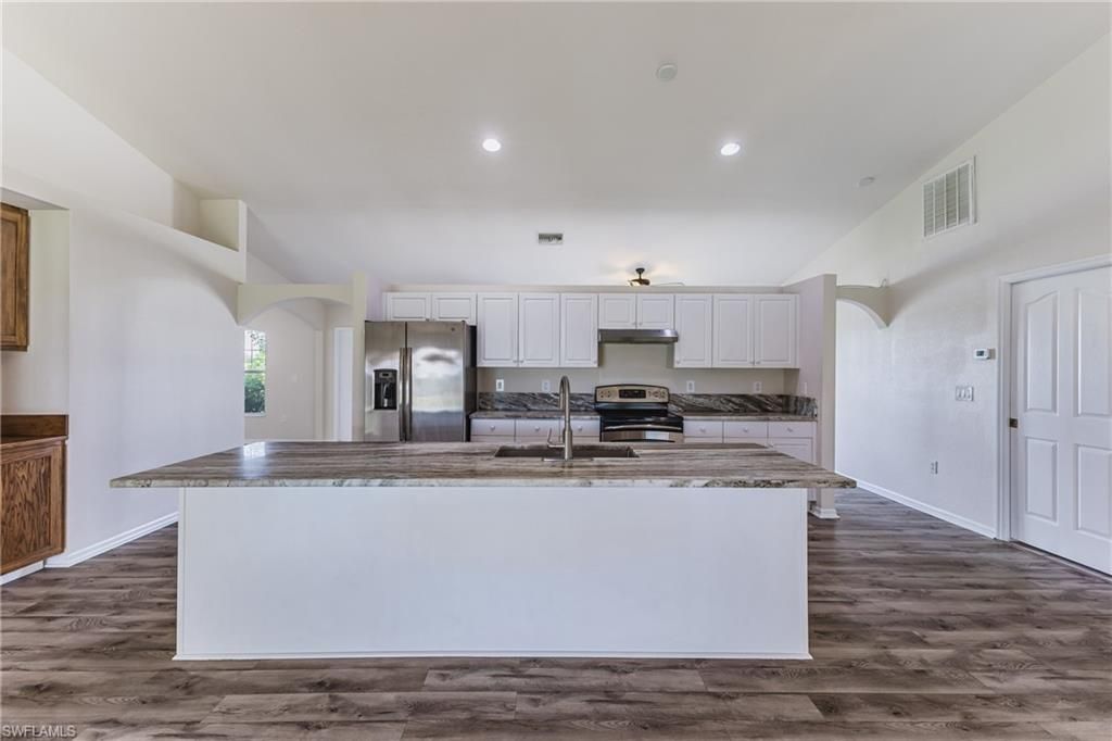 Image 16 of property listing at 408 NE 25th ST, Cape Coral, FL 33909