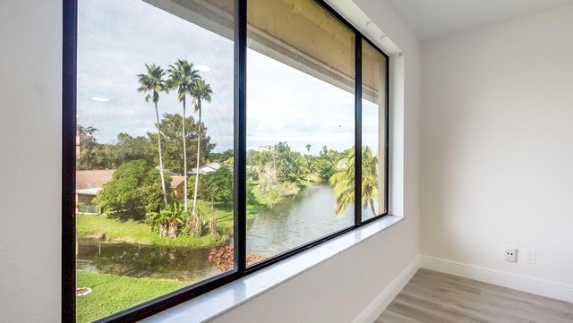 11477 NW 39th Court 301-1, Coral Springs, FL 33065