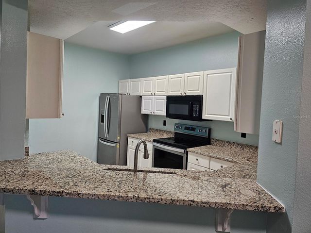 5506 METROWEST BOULEVARD 13-103, Orlando, FL 32811