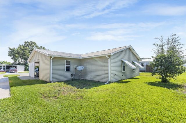 1114 PARADISE DRIVE, Lady Lake, FL 32159