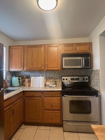 8285 Sunrise Lakes Boulevard 106, Sunrise, FL 33322