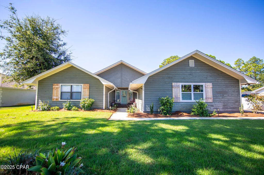 Image 1 of property listing at 215 Moonlight Bay Drive, Panama City Beach, FL 32407
