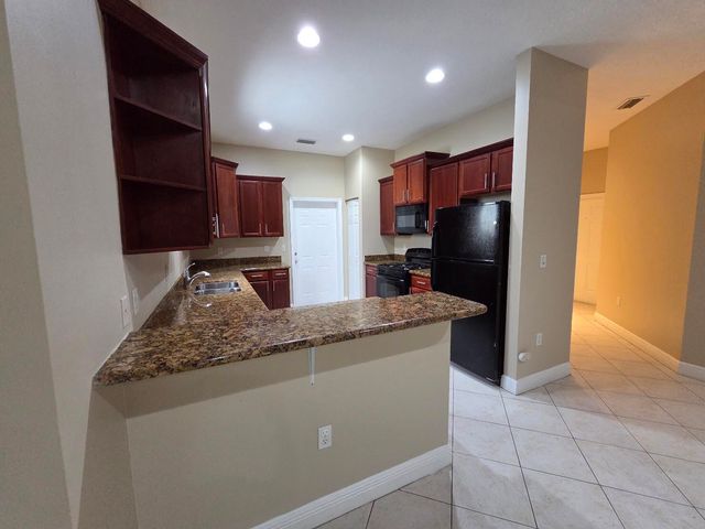 4409 COQUINA WINDS Way, Greenacres, FL 33463