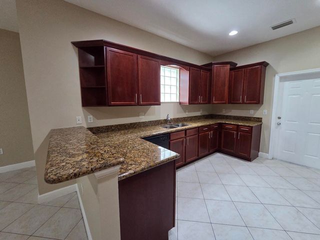 4409 COQUINA WINDS Way, Greenacres, FL 33463