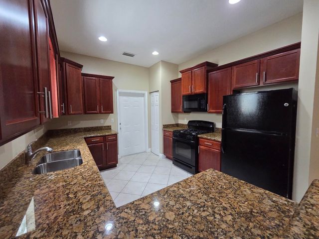 4409 COQUINA WINDS Way, Greenacres, FL 33463