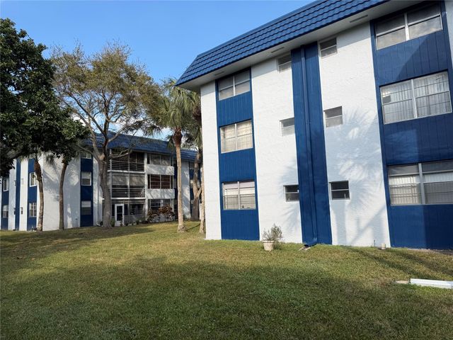 3050 Holiday Springs Boulevard 105, Margate, FL 33063