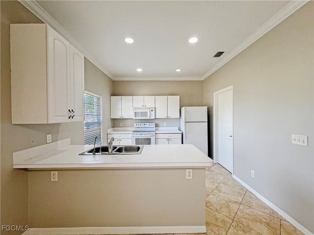 906 Alfreda AVE, Lehigh Acres, FL 33971