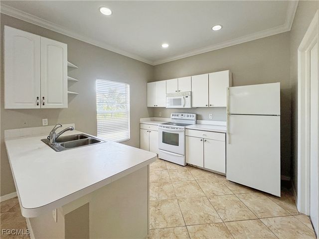 906 Alfreda AVE, Lehigh Acres, FL 33971