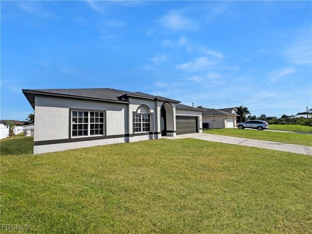 906 Alfreda AVE, Lehigh Acres, FL 33971