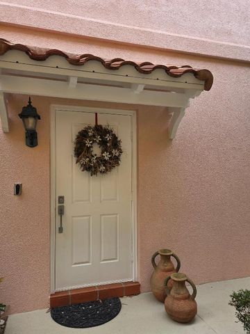 58 Tall Oaks Circle, Tequesta, FL 33469