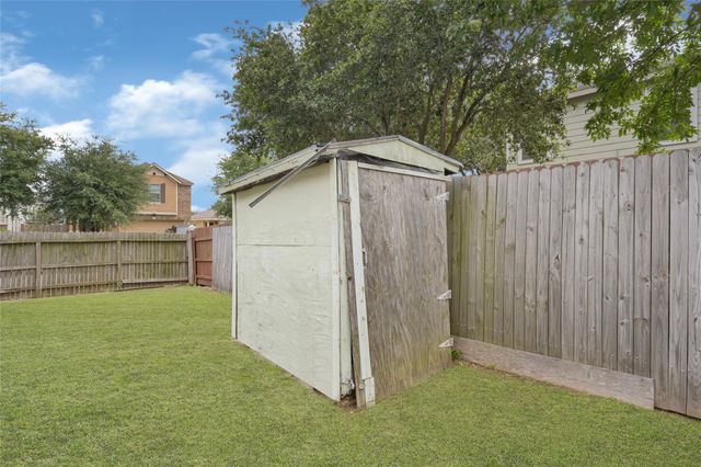 7715 Sagemark Ridge Drive, Cypress, TX 77433