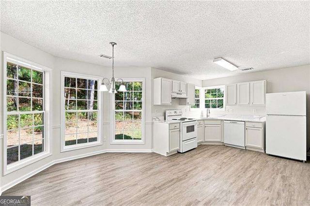 1335 Saint Isabella Court, Locust Grove, GA 30248