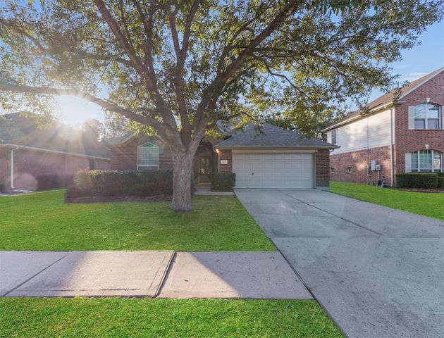 18615 Woodglen Shadows Drive, Humble, TX 77346