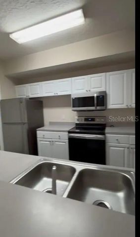 5560 METROWEST BOULEVARD 3-207, Orlando, FL 32811