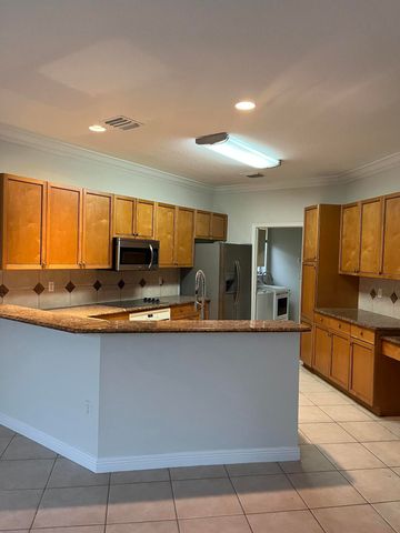 2064 Reston Circle, Royal Palm Beach, FL 33411