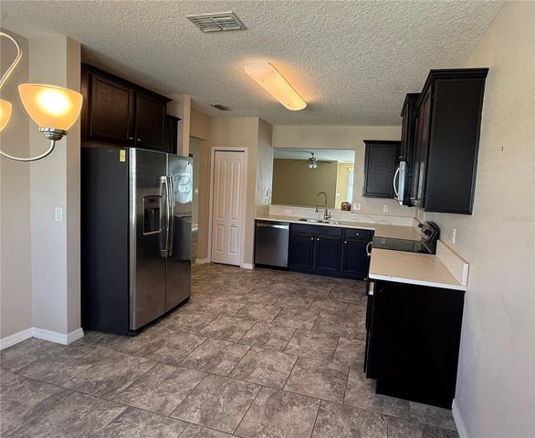 3603 UMBRELLA COURT, Tavares, FL 32778