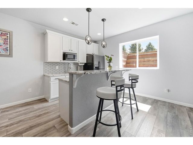 8890 Longs Peak Cir, Windsor, CO 80550