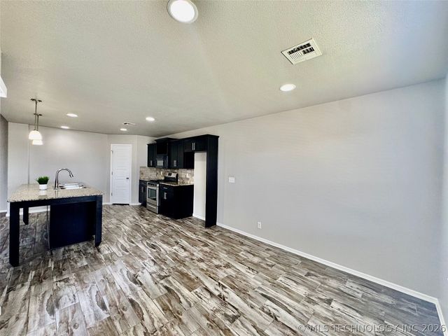 14616 E 114th Street North, Owasso, OK 74055