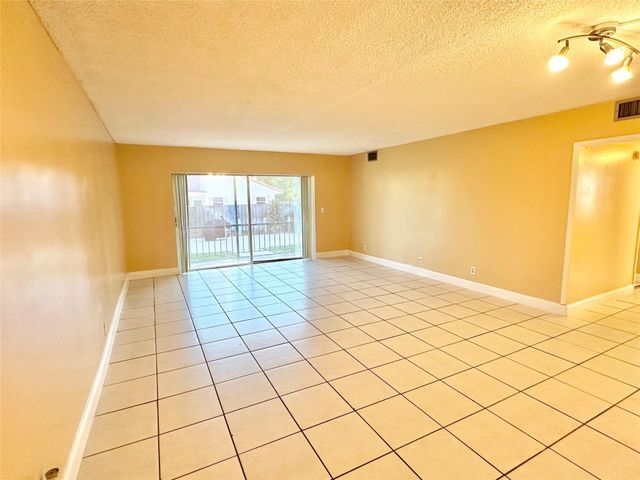 8900 W SAMPLE Road 106, Coral Springs, FL 33065