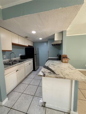 7402 Alabonson Road 407, Houston, TX 77088