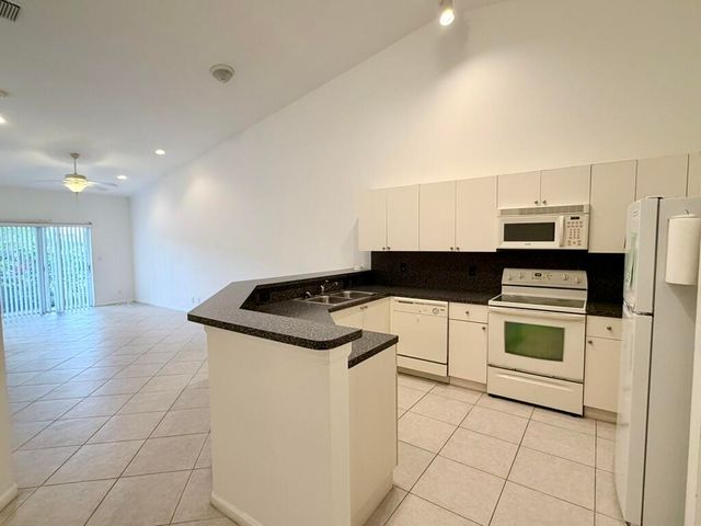 9766 Galleon Drive, West Palm Beach, FL 33411