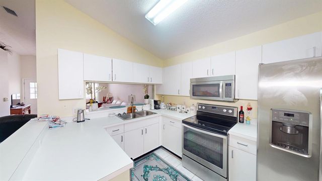 1184 NW Lombardy Drive, Port St. Lucie, FL 34986