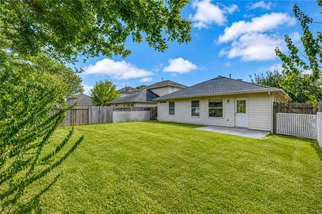 7602 Drifting Willow Court, Cypress, TX 77433