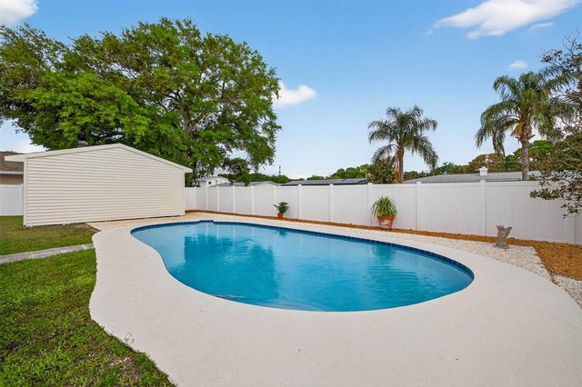 8407 MILLWOOD DRIVE, Tampa, FL 33615