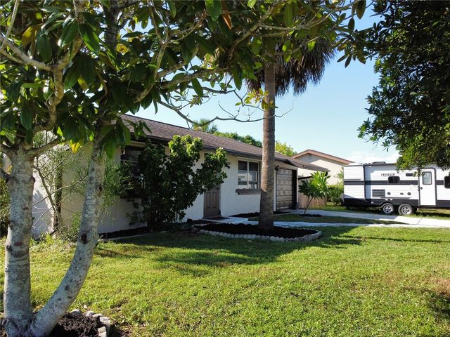 1555 BEACON DRIVE, Port Charlotte, FL 33952