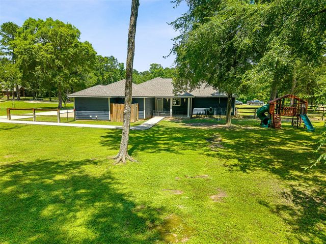 11414 Oak Springs Dr, Willis, TX 77378