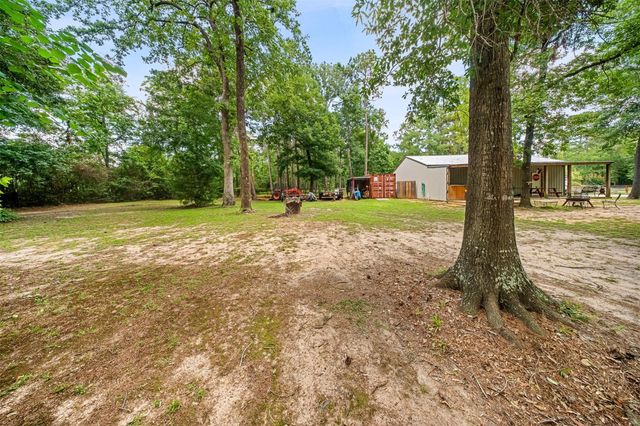 11414 Oak Springs Dr, Willis, TX 77378