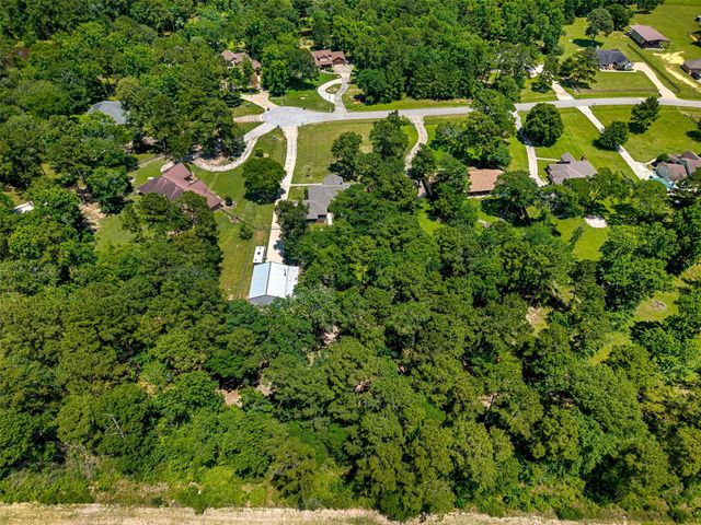 11414 Oak Springs Dr, Willis, TX 77378