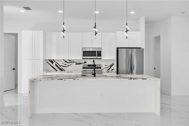 3418 8th ST SW, Lehigh Acres, FL 33976