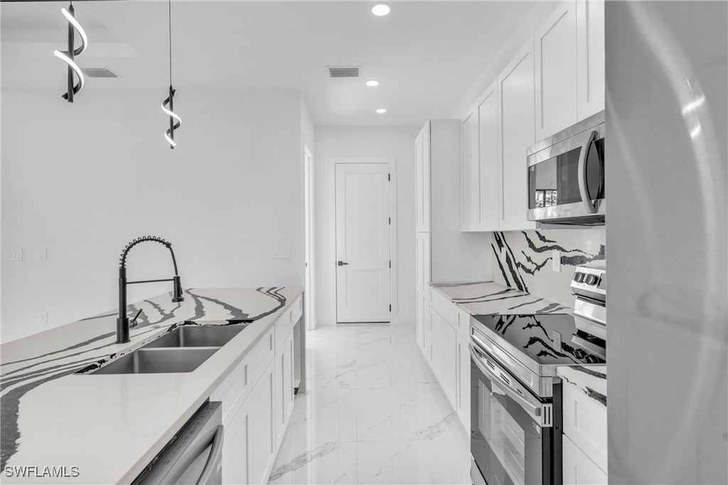 3418 8th ST SW, Lehigh Acres, FL 33976