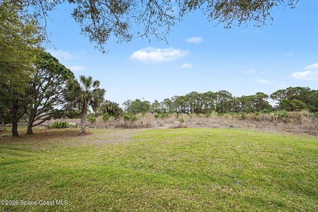 1964 Muirfield Way SE, Palm Bay, FL 32909