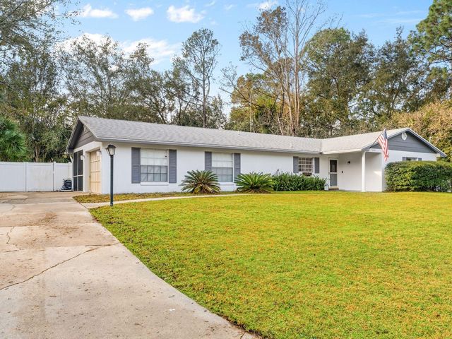 1002 PINE TREE DRIVE, Eustis, FL 32726