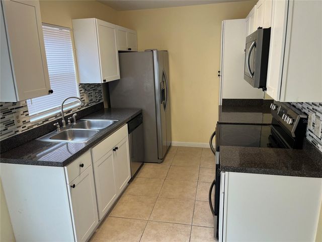 1733 SHADY RIDGE COURT 233, Orlando, FL 32807