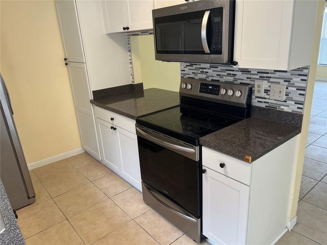 1733 SHADY RIDGE COURT 233, Orlando, FL 32807