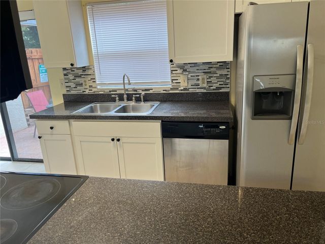 1733 SHADY RIDGE COURT 233, Orlando, FL 32807