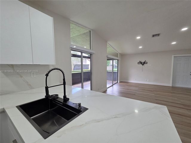 15798 Woodgate Ct E, Sunrise, FL 33326