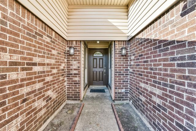 6906 Windy Pines Drive, Spring, TX 77379