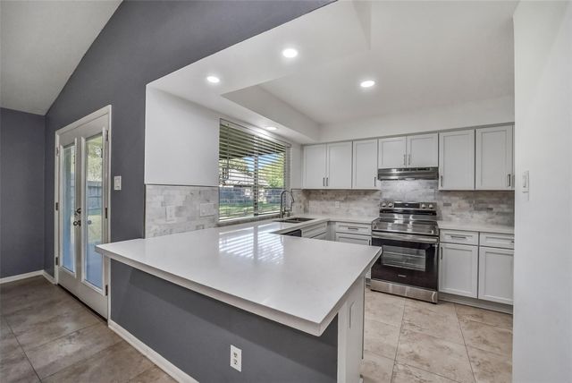6906 Windy Pines Drive, Spring, TX 77379