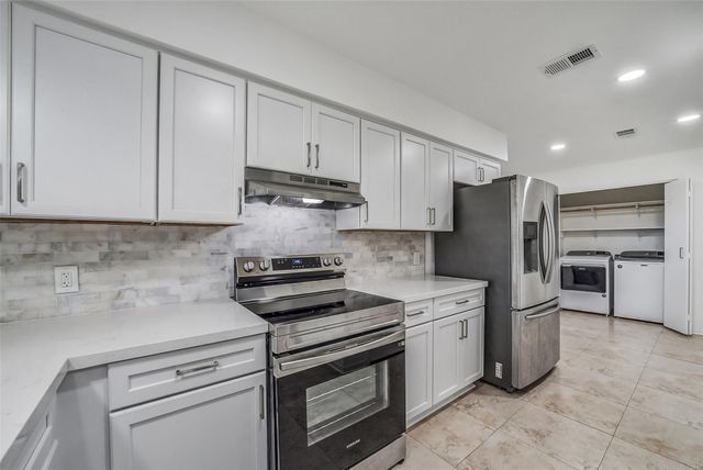 6906 Windy Pines Drive, Spring, TX 77379