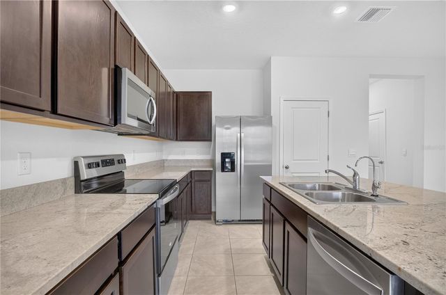 33028 TULIP PETAL LANE, Wesley Chapel, FL 33545