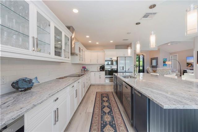 549 Eagle Creek DR, Naples, FL 34113