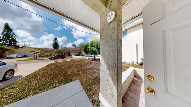 140 Pheasant Run Boulevard, West Palm Beach, FL 33415