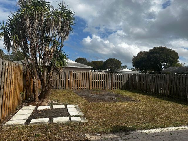 140 Pheasant Run Boulevard, West Palm Beach, FL 33415